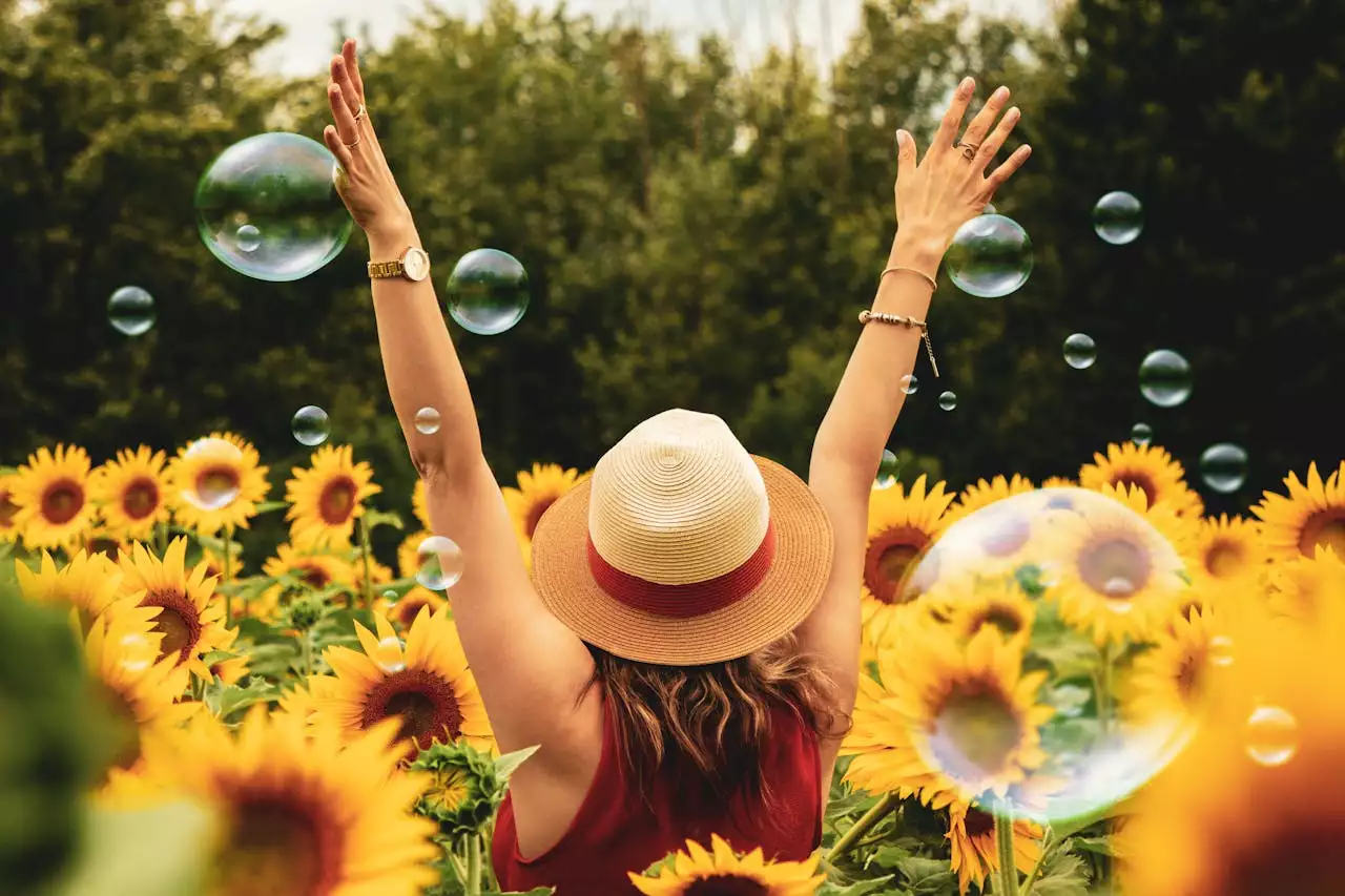 femme dans un champs de tournesol